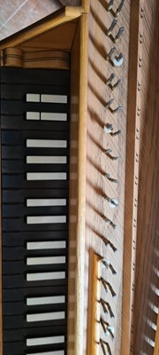 Lot 236 - An oak spinet piano