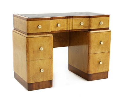 Lot 459 - An Art Deco  maple desk