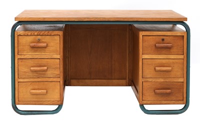 Lot 324 - An oak and tubular-framed desk