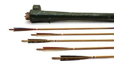 Lot 18 - Archery; a tin plate quiver of target arrows by Buchanan of Piccadilly