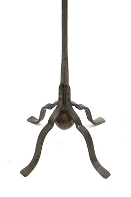 Lot 128 - An Arts and Crafts wrought iron standard lamp