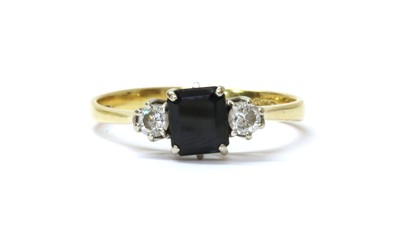 Lot 168 - An 18ct gold sapphire and diamond three stone ring
