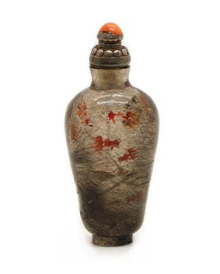 Lot 147 - A Chinese inside-painted rutilated quartz snuff bottle