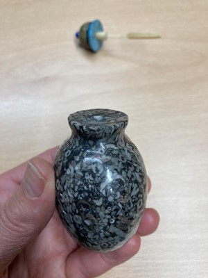 Lot 146 - A Chinese crinoid marble snuff bottle