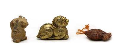 Lot 134 - A Chinese gilt metal weight