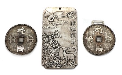 Lot 132 - A Chinese two-part silver belt buckle
