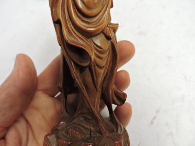 Lot 135 - A Chinese wood carving