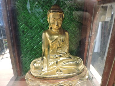 Lot 124 - An Indian gilt lacquered Buddha