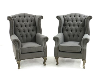 Lot 489 - A pair of Queen Anne style wingback chairs
