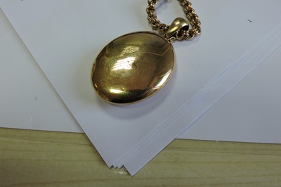 Lot 65 - A Victorian gold diamond set locket and chain