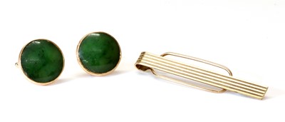 Lot 282 - A pair of gold nephrite jade swivel cufflinks, c.1970