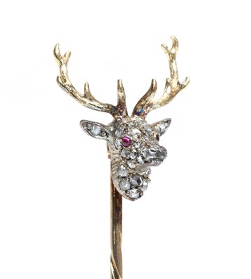Lot 94 - A diamond set stag head stick pin