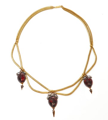 Lot 53 - A Victorian gold cabochon garnet and diamond swag necklace, c.1850