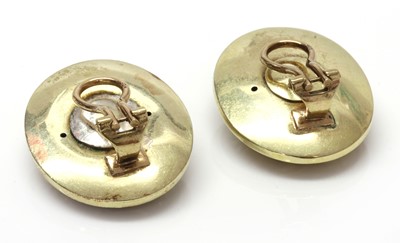 Lot 320 - A pair of oval repoussé earrings