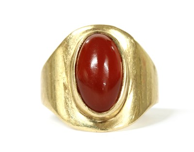 Lot 396 - A 9ct gold single stone cornelian ring