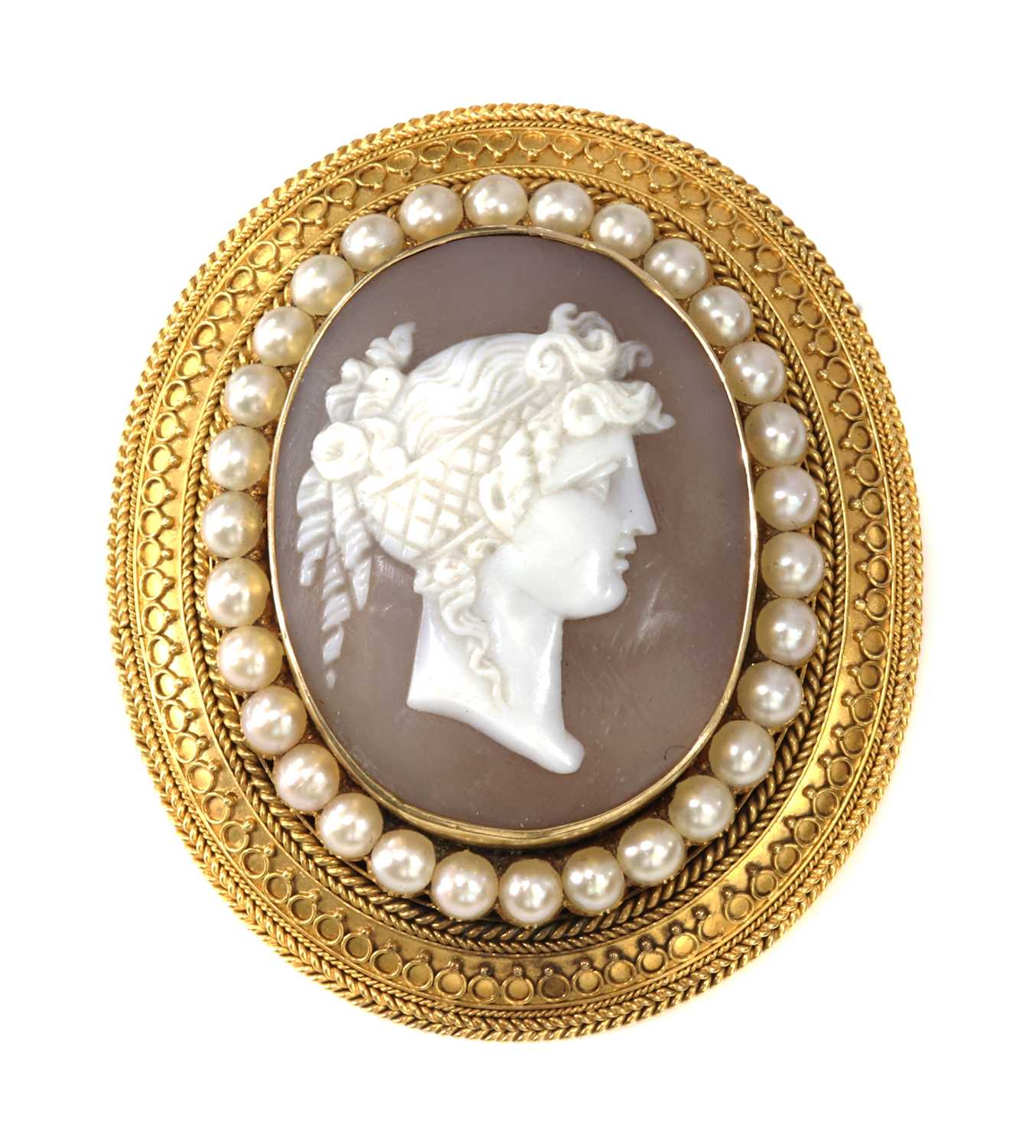 Lot 54 - A Victorian gold archaeological revival, Etruscan style, shell cameo and split pearl brooch, c.1870