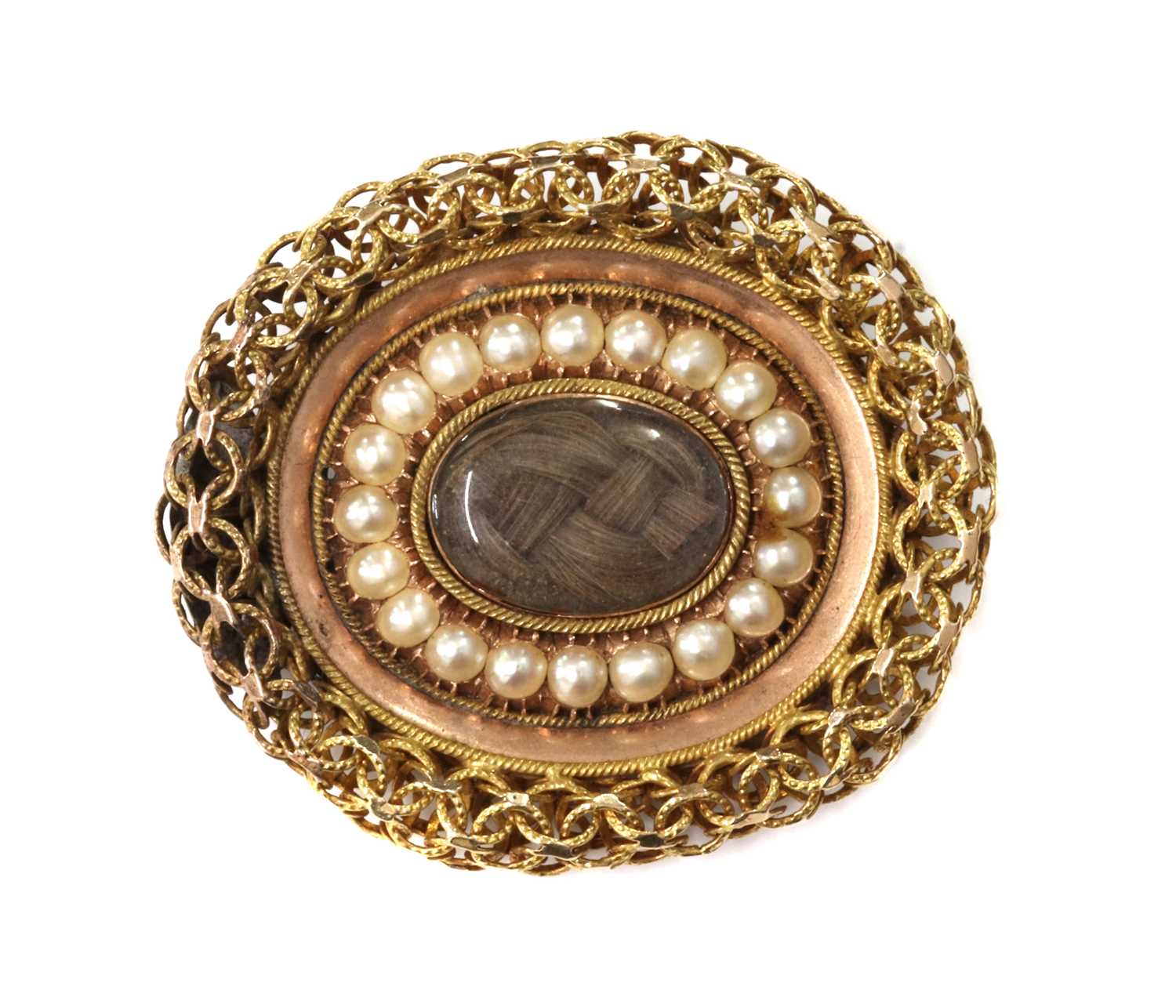 Lot 40 - A gold split pearl oval memorial brooch, c.1810-1820