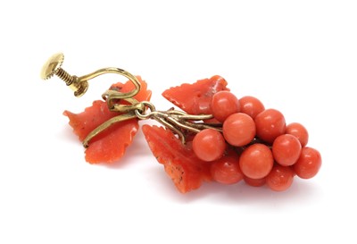 Lot 242 - A Victorian carved coral grape and vine single drop earring