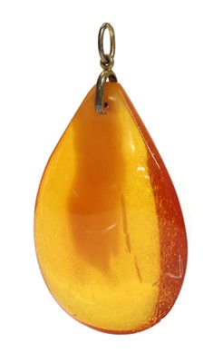 Lot 214 - A cognac amber pendant
