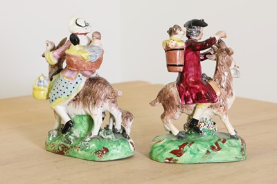 Lot 185 - A pair of Staffordshire pottery figures