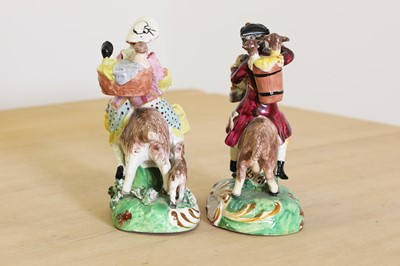 Lot 185 - A pair of Staffordshire pottery figures