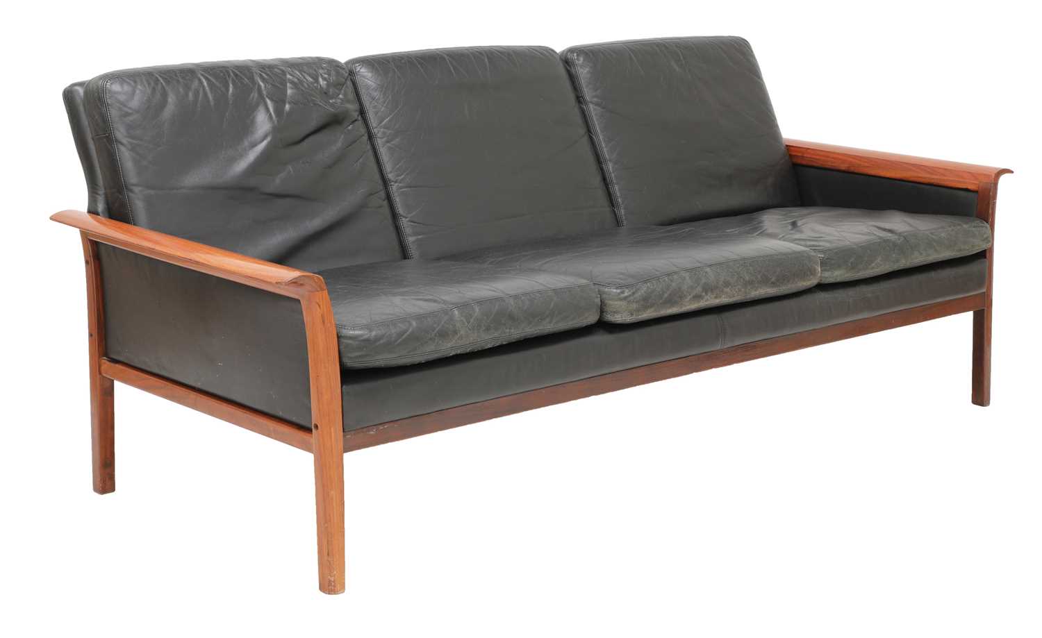 Lot 471 - A Danish black leather sofa