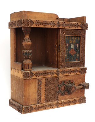 Lot 35 - A chip-carved wooden wall-hanging cabinet
