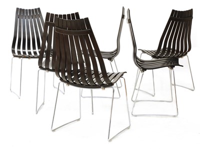 Lot 705 - A set of six ebonised 'Scandia' chairs