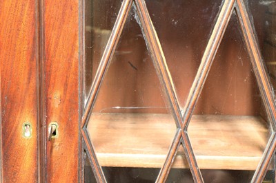Lot 434 - A George III style mahogany small secretaire bookcase
