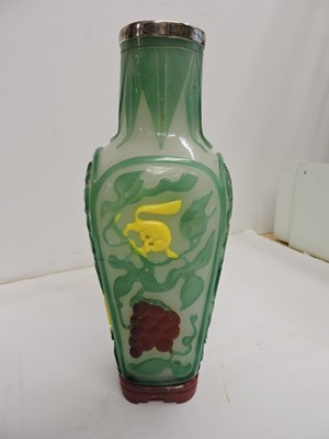 Lot 77 - A Chinese six-colour overlay Peking glass vase