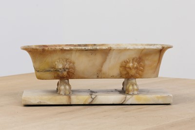 Lot 757 - A grand tour carved alabaster cistern