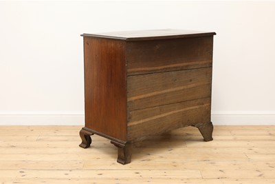 Lot 335 - A George III mahogany serpentine chest
