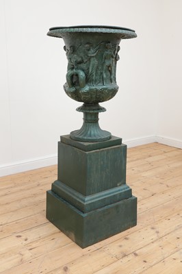 Lot 840 - A Victorian cast iron garden urn and stand