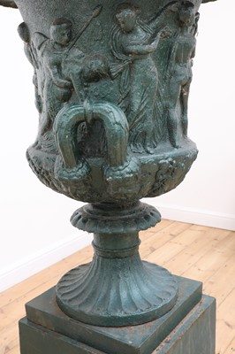 Lot 840 - A Victorian cast iron garden urn and stand