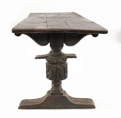 Lot 242 - An oak refectory table