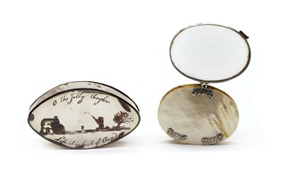 Lot 34 - A mid 18th century unmarked silver and mother of pearl oval magnifying glass