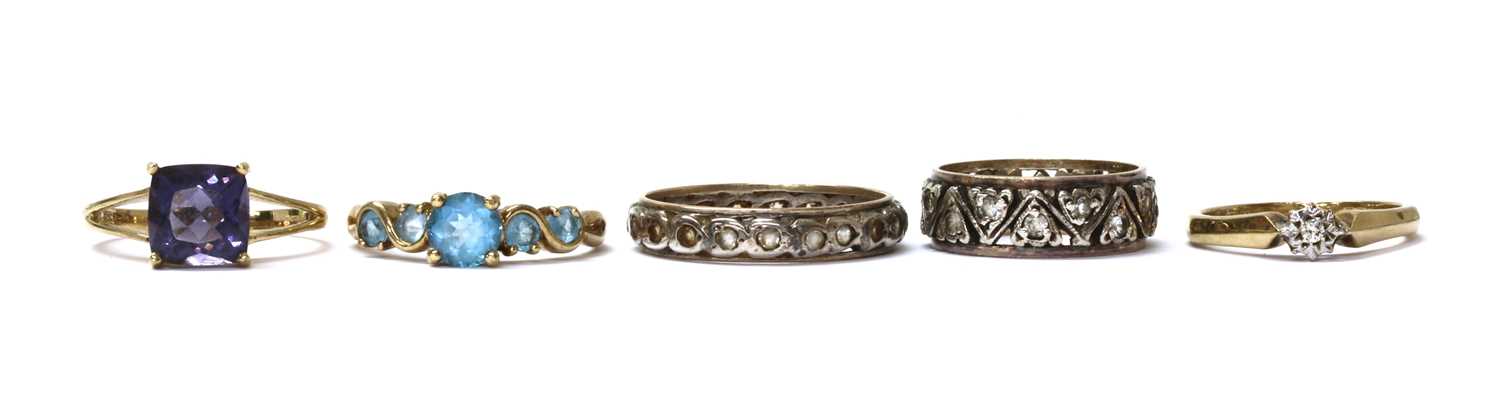 Lot 222 - Five silver and gold rings