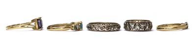 Lot 222 - Five silver and gold rings
