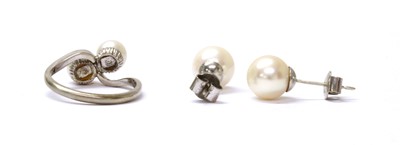 Lot 213 - A white gold cultured pearl crossover ring