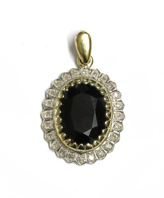 Lot 283 - A 9ct gold sapphire diamond pendant