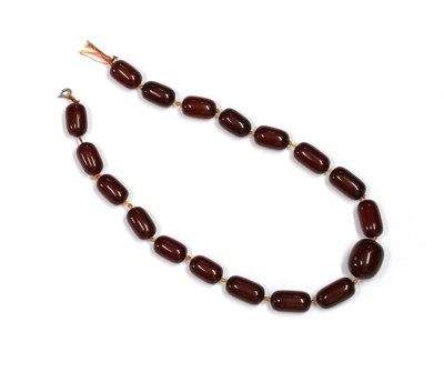 Lot 38 - A single row cherry coloured Bakelite bead necklace