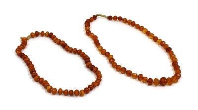 Lot 63 - A single row uniform butterscotch amber bead string