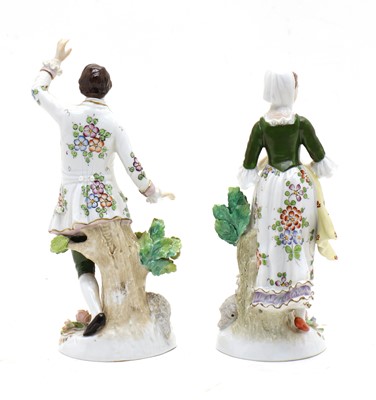 Lot 73 - A pair of Sitzendorf porcelain figures of a shepherd and shepherdess