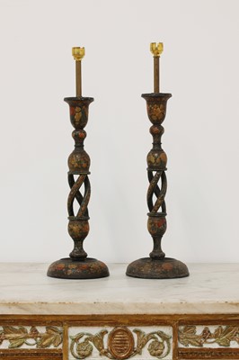 Lot 50 - A pair of Indian papier mâché candlesticks