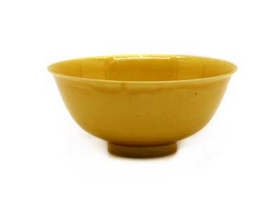 Lot 147 - A Chinese yellow glazed bowl