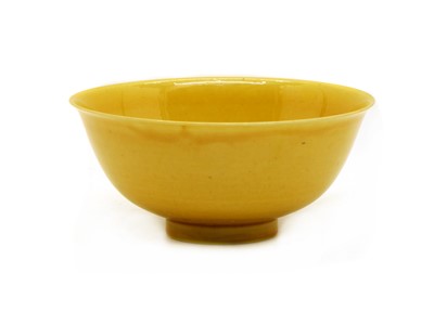 Lot 147 - A Chinese yellow glazed bowl