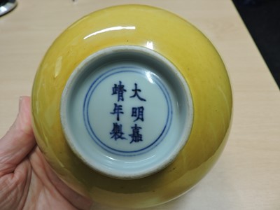 Lot 147 - A Chinese yellow glazed bowl