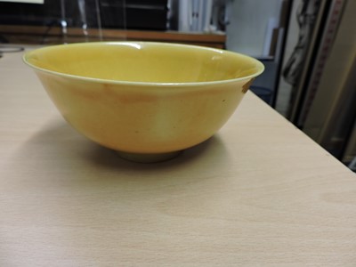 Lot 147 - A Chinese yellow glazed bowl