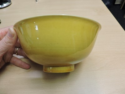 Lot 147 - A Chinese yellow glazed bowl