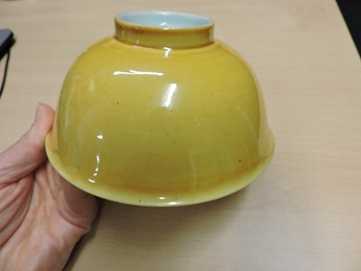 Lot 147 - A Chinese yellow glazed bowl